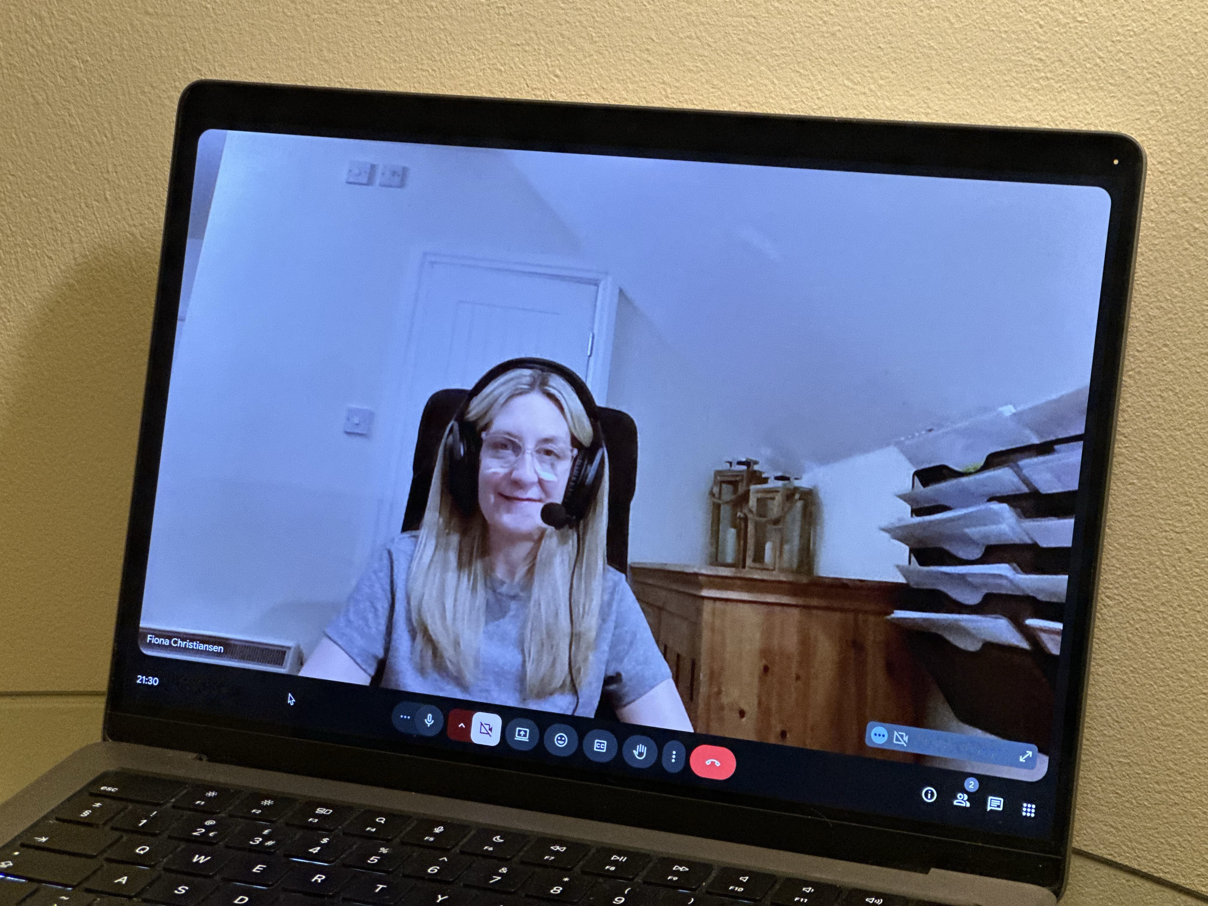 Portrait photo of Fiona Christiansen on a laptop screen